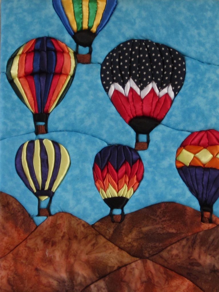E. Cristina Diaz-Arntzen: Albuquerque Balloon Festival triptych