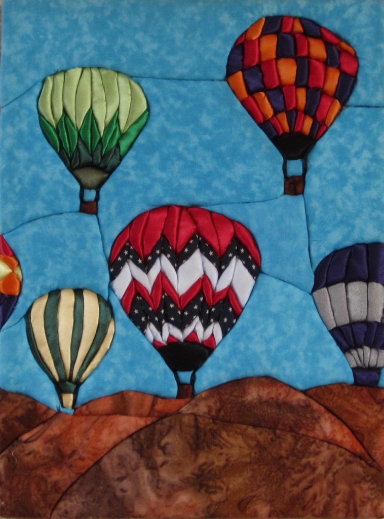 E. Cristina Diaz-Arntzen: Albuquerque Balloon Festival triptych (#3)